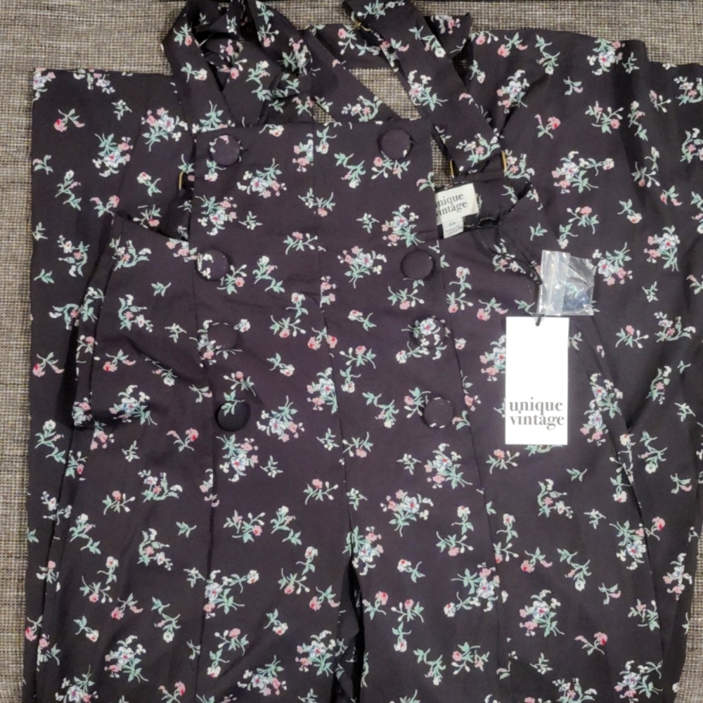 Unique vintage overall pants. Black with small floral design. Women's small/4